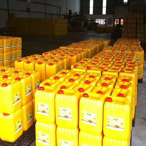 Pallets of yellow jerrycans of edible oil in a warehouse